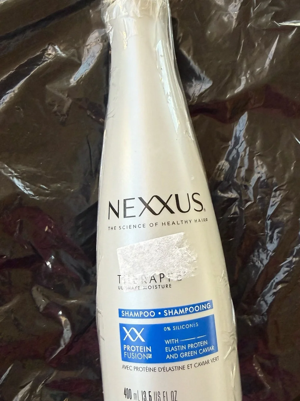 Nexxus Therappe Ultimate Moisture Shampoo - White Bottle with Blue Label